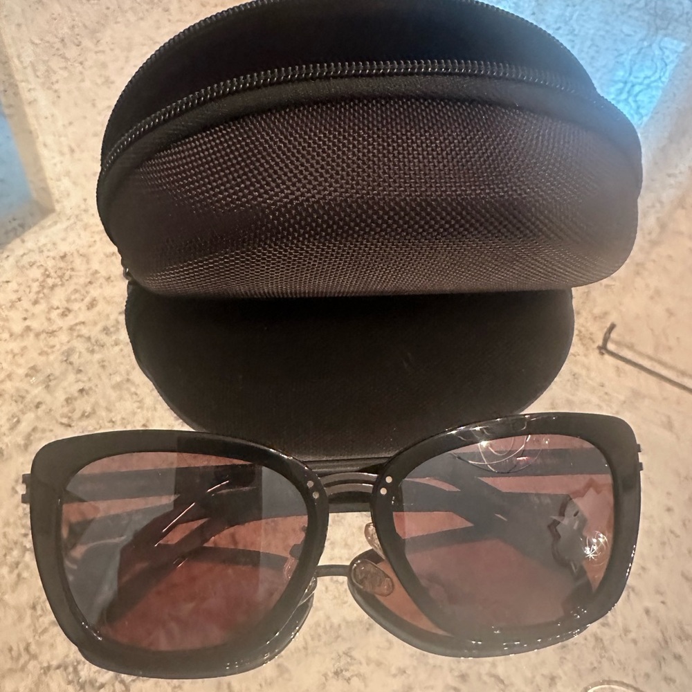 Women’s RĒVO Black Sunglasses with Case